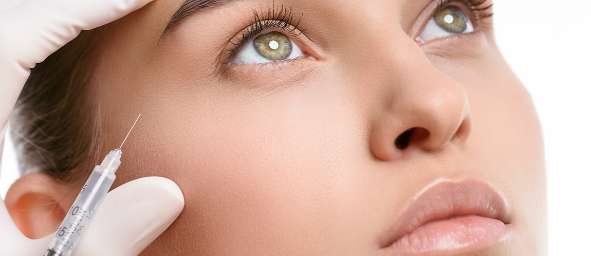 Woman getting injection near her eye