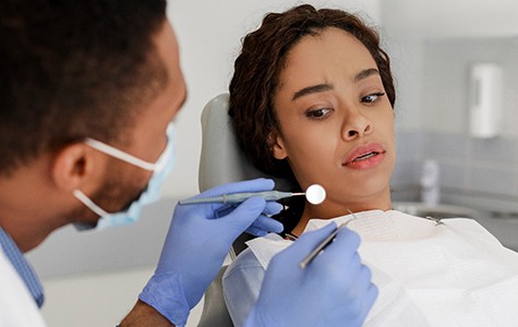 Woman afraid at the dentist