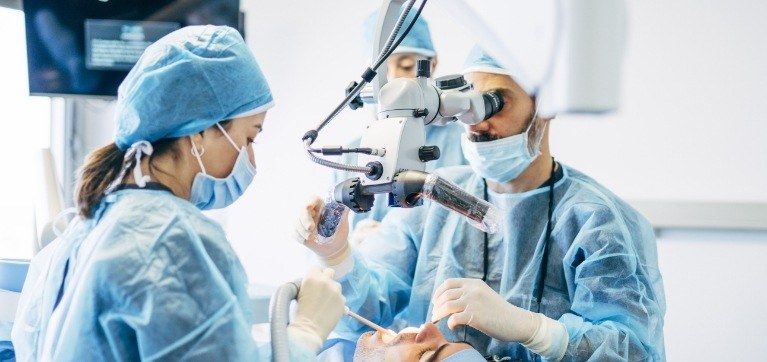 Oral surgeon performing a procedure