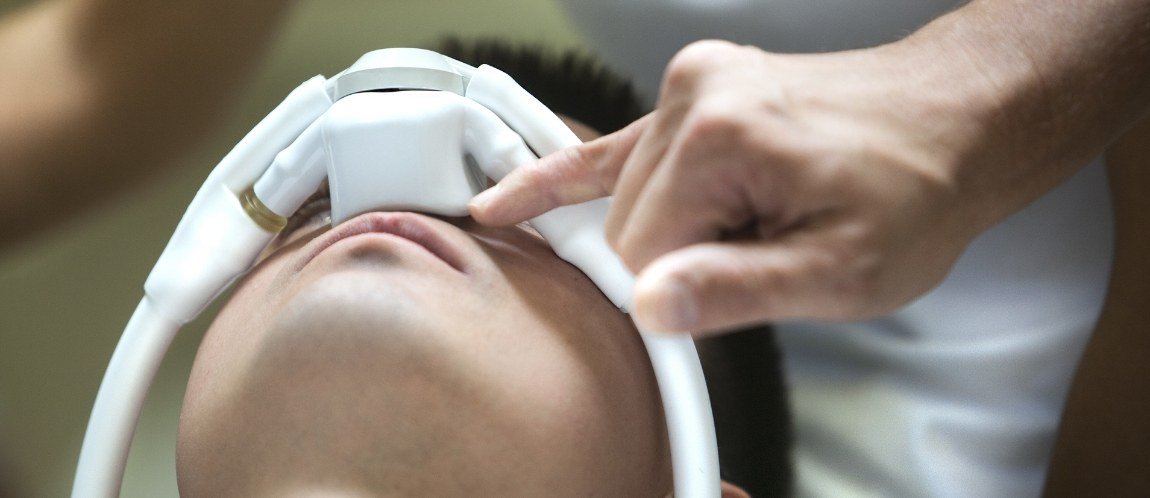 Person in dental chair with mask over their nose