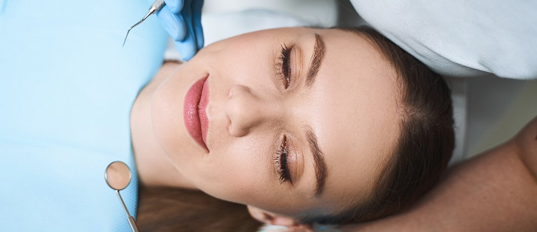 Relaxed woman at the dental office